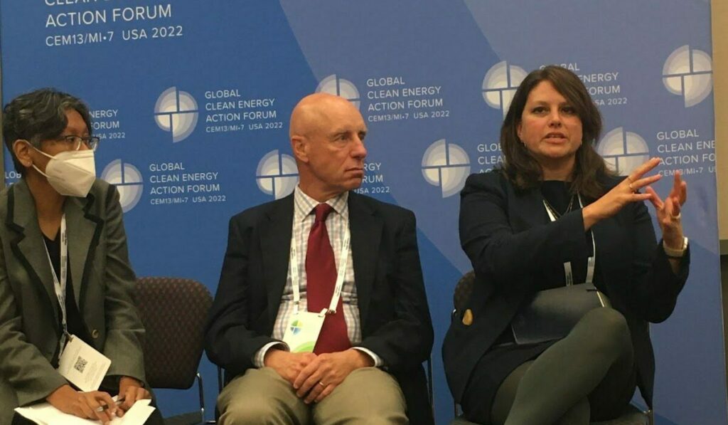 Sean O'Leary and Shanti Gamper-Rabindran listen to Joanne Kilgour during a panel discussion at the Global Clean Energy Action Forum.