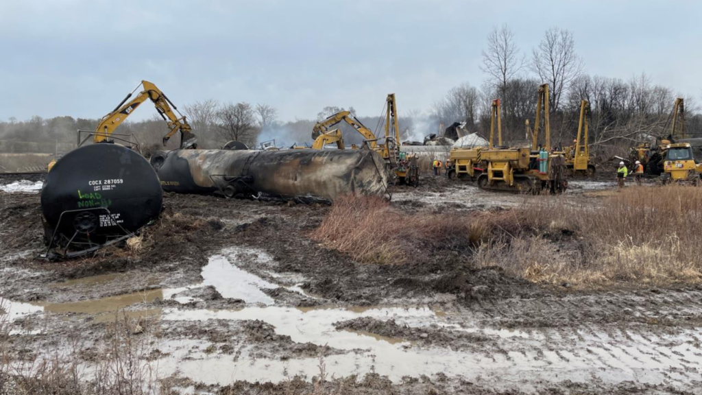 Crews work to clean up derailed Norfolk-Southern train cars in East Palestine, Ohio.