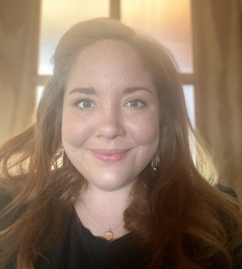 Headshot of Justine Hackimer.