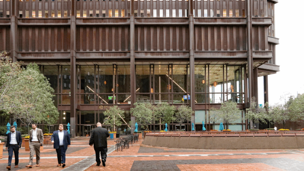 Businessmen walk below the U.S. Steel Tower in Pittsburgh.